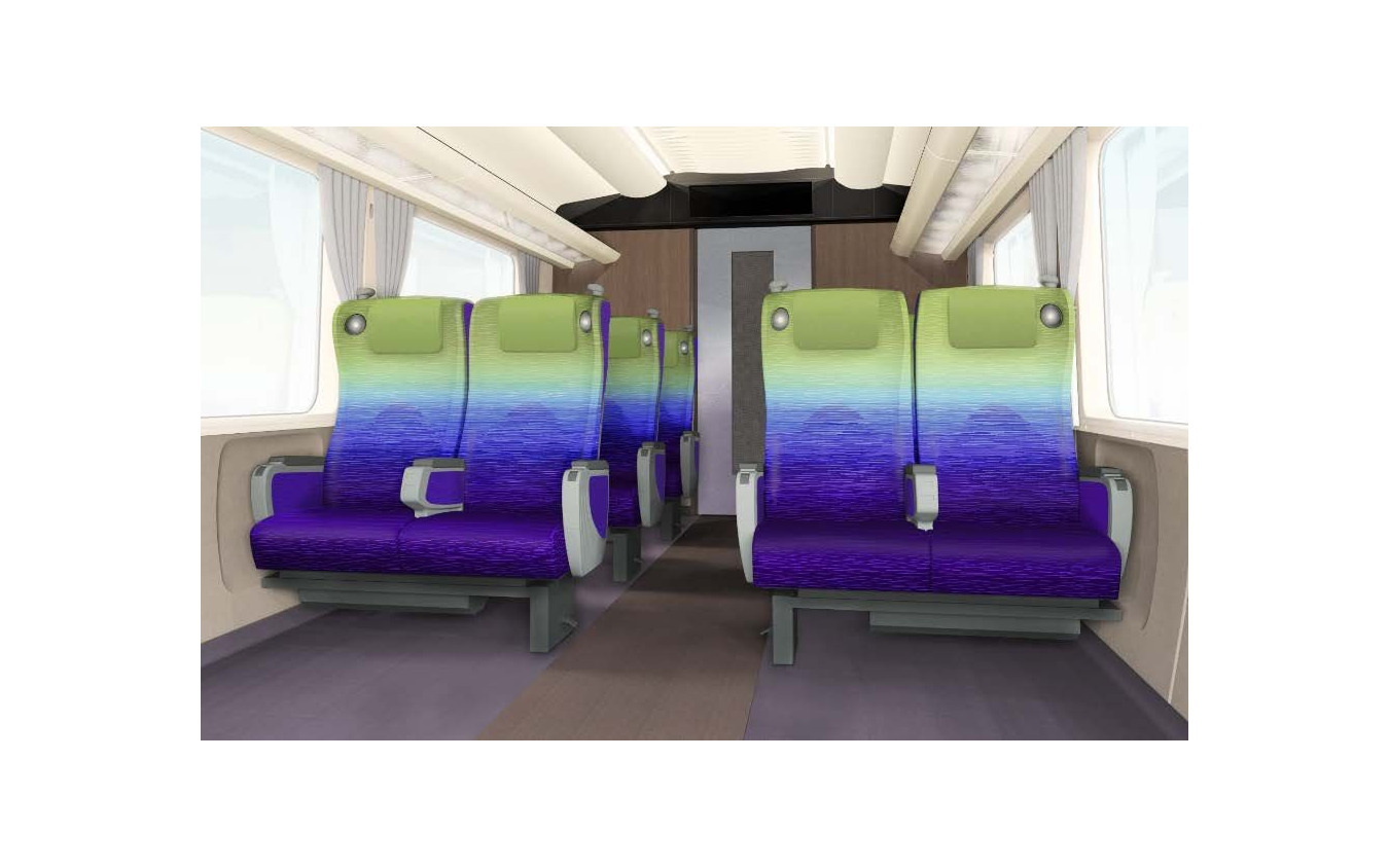 グリーン車のイメージ。座席配置は2＋2で、モケットは沿線の新緑や夕暮れの紫の空をグラデーション状にデザイン。落ち着いた内装とするため、内壁は濃い茶色の木目となっている。