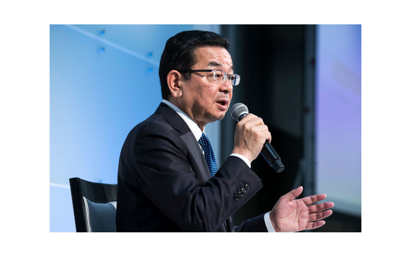 記者会見するホンダの八郷社長 (c) Getty Images