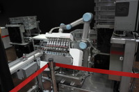 マツダの子会社、おにぎり箱詰めロボットで食品機械業界に殴り込み---価格5分の1を狙う 画像