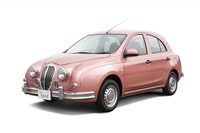 光岡 ビュート に桜色ボディの特別仕様車 画像