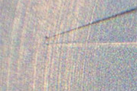 JAXA、「はやぶさ」が持ち帰った小惑星「イトカワ」の微粒子を公開展示 画像