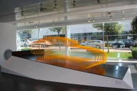 メルセデス AMG GT、ドイツ本社で「実物大」の予告 画像
