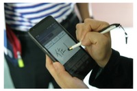 佐川急便“スマホへサイン”で荷物を受領…配達完了通知も迅速 画像
