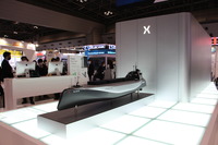 パワーエックスブース。定置用蓄電池「Mega Power」や電気運搬船「Power ARK 100」の大型模型が展示されていた(スマートグリッドEXPO 2023)
