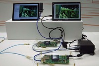 会場では次世代の光ハーネスで信号を分岐させるデモが展開されていた