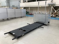 三菱重工グループの三菱重工機械システム(MHI-MS)が開発した自動車を自律的に運搬する車両搬送ロボット