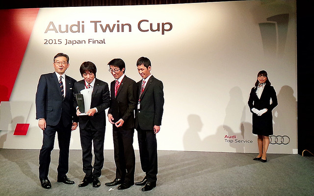 テクノロジー部門で優勝したAudi宇都宮チームとアウディジャパン代表取締役・齋藤徹氏（左）