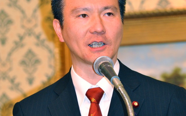 「この分野のビジネスがますます拡大していかないといけない」と話す加藤公一法務副大臣（撮影＝中島みなみ）