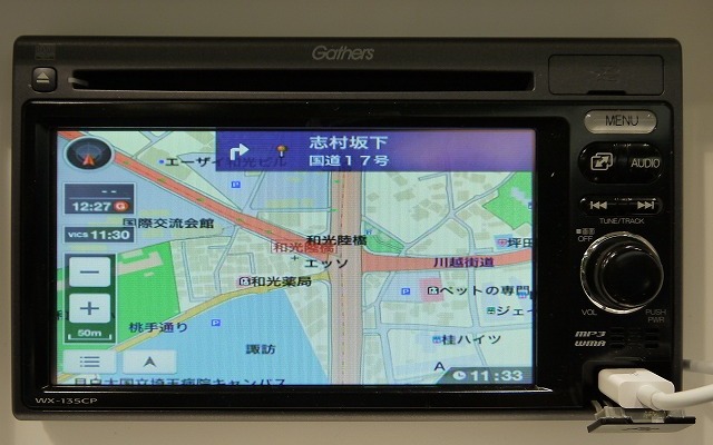 ホンダが参考出品した「ディスプレイコンポ」は、ホンダアクセスから発売されるDOPナビ。iPhoneのナビアプリを転送して使う。