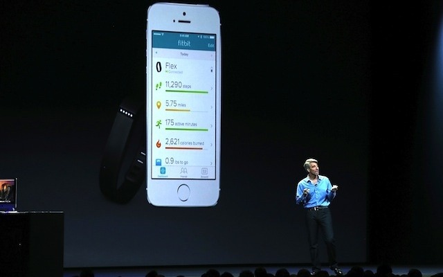 iOS 8を解説するクレイグ・フェデリギ（ソフトウェアエンジニアリング担当上級副社長）　(c) Getty Images