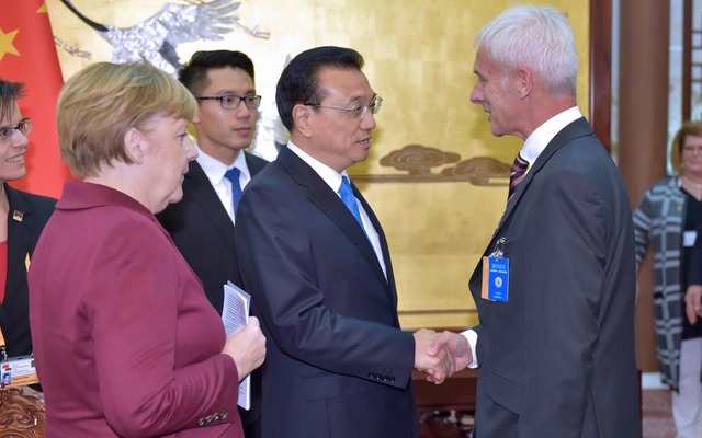 ドイツのメルケル首相の中国訪問に同行したフォルクスワーゲングループのマティアス・ミューラーCEO