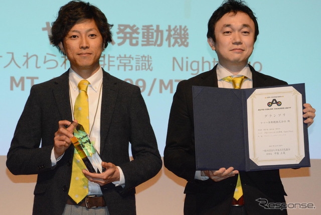 安田主事(左)と片平デザイナー