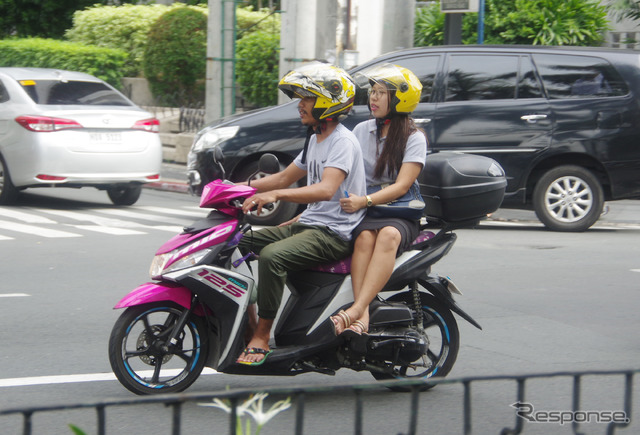 フィリピン・マニラ市内を走るヤマハ『MIO』。鮮やかなマゼンタカラーが人気だ