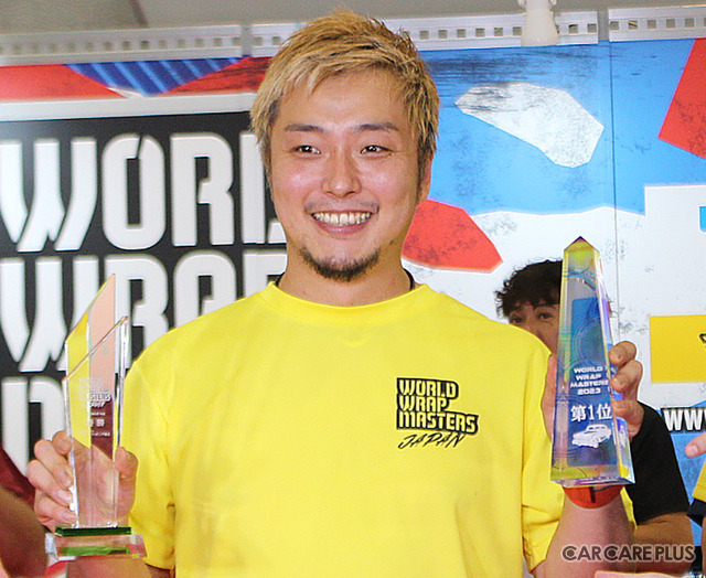 プロたちが「カーラッピング」施工の技能を競い合う…優勝は三連覇達成の川上裕貴氏