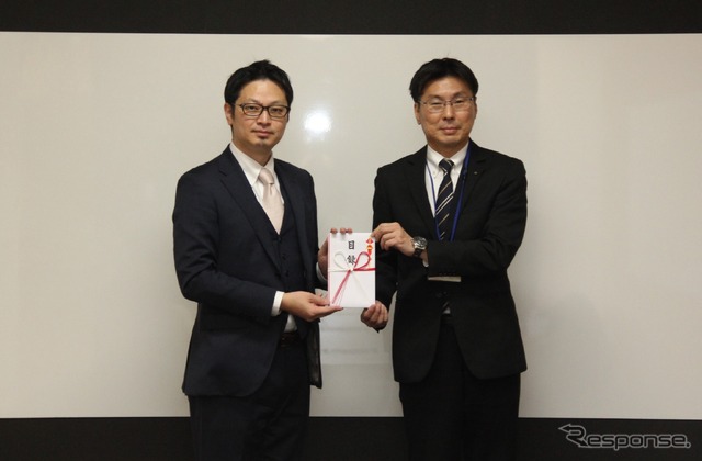 左：ナイルの大谷昌史 執行役員社長補佐、右：福島県生活環境部生活交通課の佐藤司課長