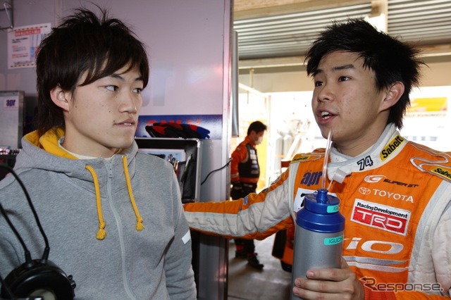 井口選手（向かって右）とパートナーの国本雄資選手