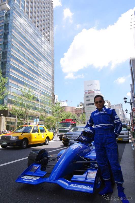 オーナーの石川剛さん。左に見えるのは東京ミッドタウンだ