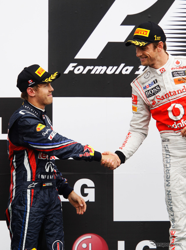 ベッテル（向かって左）とバトン（F1カナダGP）