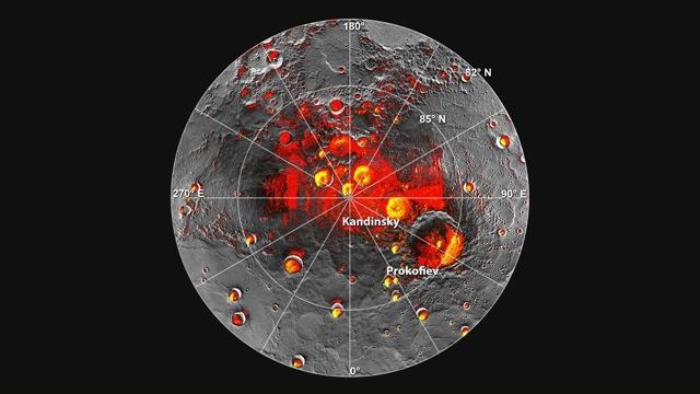 メッセンジャーが観測した、水星の北極地方の地形図。赤い部分が日陰。 NASA/Johns Hopkins University Applied Physics Laboratory/Carnegie Institution of Washington/National Astronomy and Ionosphere Center, Arecibo Observatory.