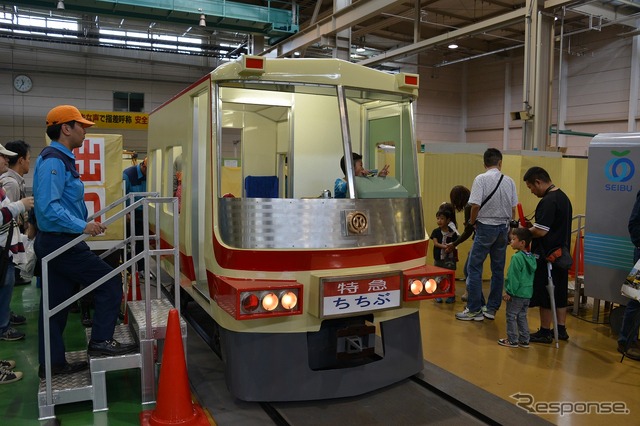 6月8日に開催された車両工場公開イベント「西武・電車フェスタ2014 in 武蔵丘車両検修場」の様子。普段は目にすることができない検修作業の実演などが行われた。