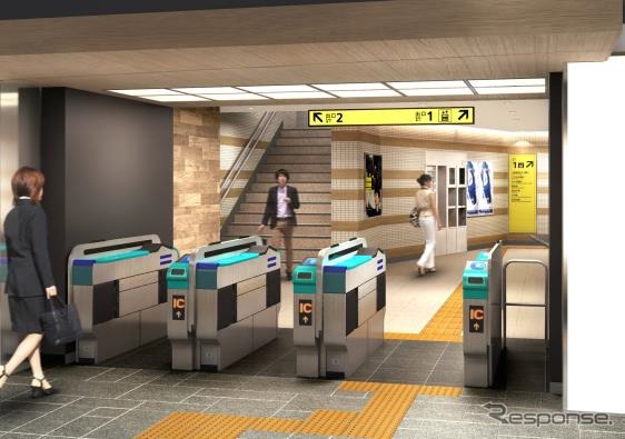 稲荷町駅(改札口):温かみのある木調の壁で構成する。