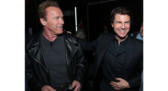 トム・クルーズ、アーノルド・シュワルツネッガー/シネマコン - (C) ABImages