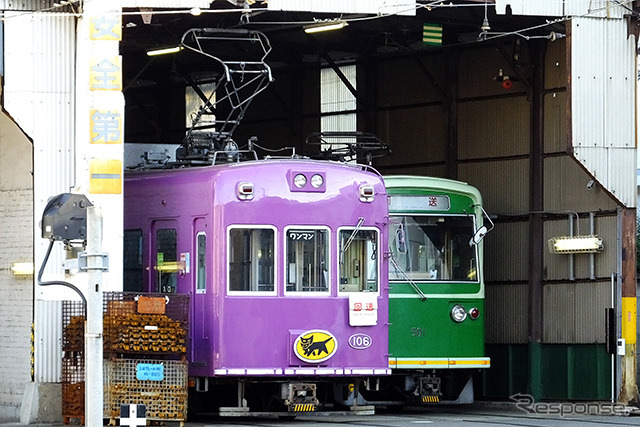 トラックは信号を確認しながらゆっくりと西院車庫を離れていく