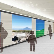 新千歳空港ターミナルビル～新千歳空港駅間の連絡通路もリニューアル。壁面には北海道をイメージしたシートを配置し、広告の周囲に白樺をイメージした装飾を施す。