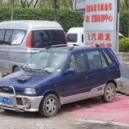 シートカバーを付けた北京の車。