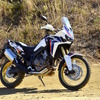 CRF1000L Africa Twin パールグレアホワイト（トリコロール）。前後タイヤはオフロード走行用に交換されている。