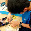 埼玉大学サテライトキャンパスで行われた「STEM Camp 2016」（3月31日）。子どもたちが4脚ロボットの製作に挑戦した