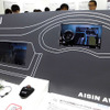 「超リアル3D市街図とメータークラスターの2画面連携ナビ」を参考出品したアイシン・エィ・ダブリュ（人とくるまのテクノロジー展2016横浜）