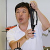 説明する青木主任
