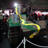 九五式軽戦車レプリカモデルや「ガールズ&パンツァー」コスプレモデル、「World of Tanks」3Dプリンターモデルなどを展示したDMM GAMESブース