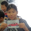 「整備・塗装職業体験」と「モノづくり体験」に参加する子どもたち（Be a driver. Experience at FUJI SPEEDWAY）