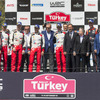 WRC第10戦トルコの表彰式。3位はヒュンダイのH.パッドン組。