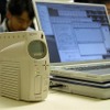 【オートサロン2002続報】幕張臨時分室のモバイルLAN、気になるFOMAは?