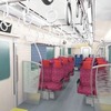 1000系モデルチェンジ車のクロスシート状態の車内イメージ。座席指定列車に使用する際はこの状態に。吊り手は径と太さを拡大し握りやすさや安全性を高める。