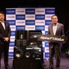 アルパインマーケティング 代表取締役社長 石田宗樹氏（左）とアルプスアルパイン 代表取締役副社長執行役員 米谷信彦氏