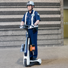 トヨタのパーソナルモビリティ、C+ walk Tを使って警備。写真は試験中のもので、トヨタが市販する仕様とは異なる。