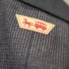 ジャケットやベストの背部には鉄道・バス共通で馬車鉄道のワッペンが付く。