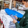 店舗でアプリを確認している様子