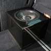 ラゲッジに置かれているサブウーファー。多くのユニットをフロア下に設置したので目にすることができるのはサブウーファーだけ。