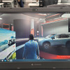 NISSAN HYPE LABのショールーム。サクラ、アリア、フェアレディZ、エクストレイルが展示されている。