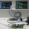 会場では次世代の光ハーネスで信号を分岐させるデモが展開されていた