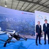 スズキ 鈴木社長（左）とSkyDrive 福澤CEO（右）