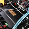 ラゲッジフロアの中央部に設置されていたのはゴールドホルンのオーディオプレイヤーであるG3 SEII。オーナーも満足なサウンドだ。