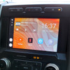 車載用Android端末（『VISIT（ビジット）』）が接続されたときの車載機の表示例。