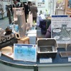 北陸軽金属工業が出展した、砂型鋳造ならではの細かい加工が特徴のHV、EV用インバータケース