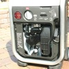 エネポ。前面カバーを取り外したところ。エンジンオイルは自動車用のものでOKだ
